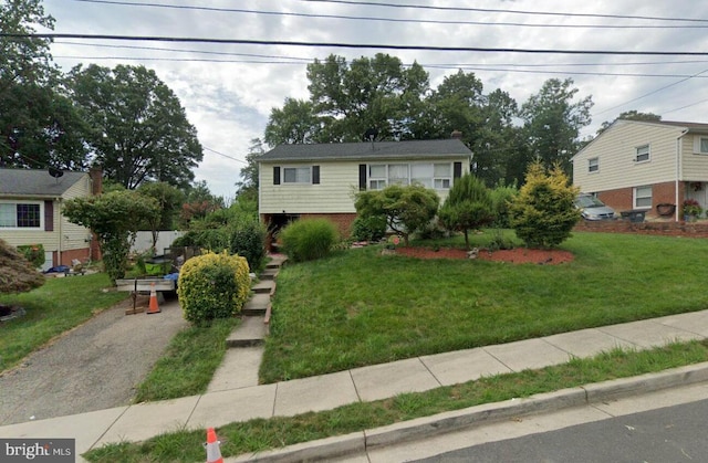 view of front of house with a front lawn