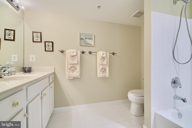 full bathroom with vanity, tile patterned flooring, toilet, and tiled shower / bath combo