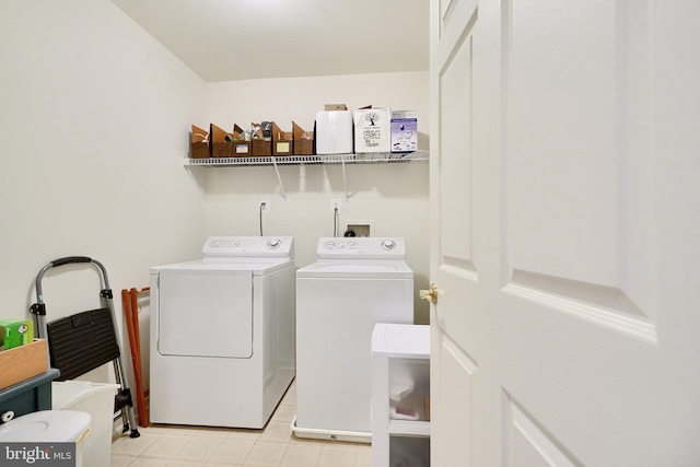 laundry area with washing machine and dryer