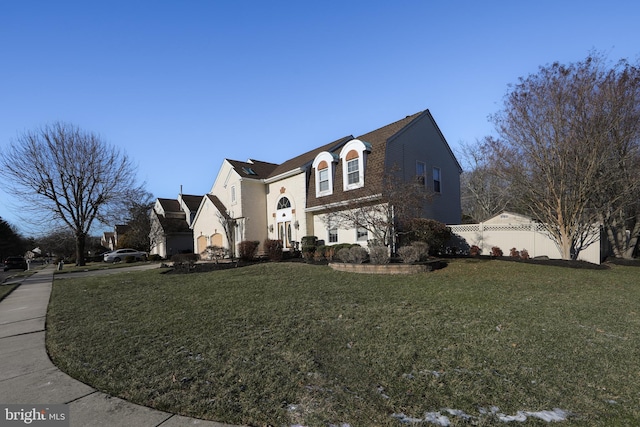 view of front of home featuring a front lawn