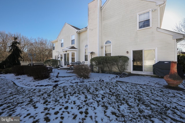 view of snow covered property