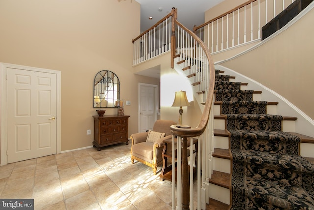 stairway with a high ceiling