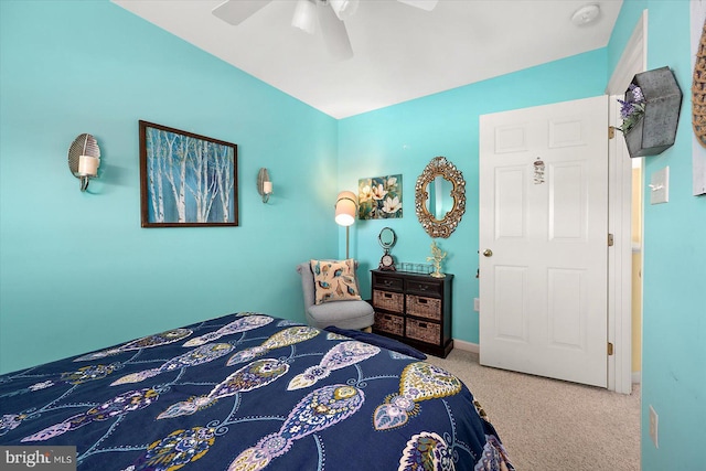 bedroom featuring ceiling fan and carpet floors