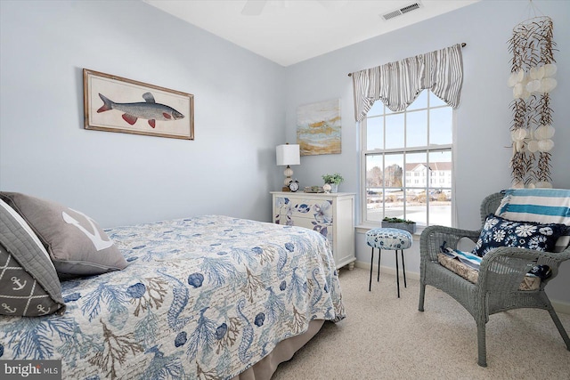 carpeted bedroom with ceiling fan