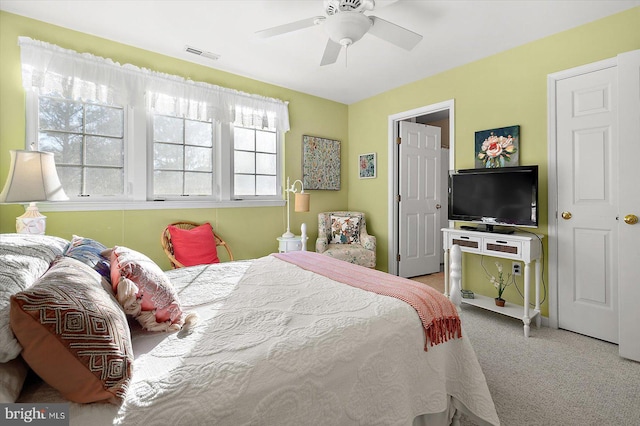 bedroom featuring ceiling fan and carpet flooring