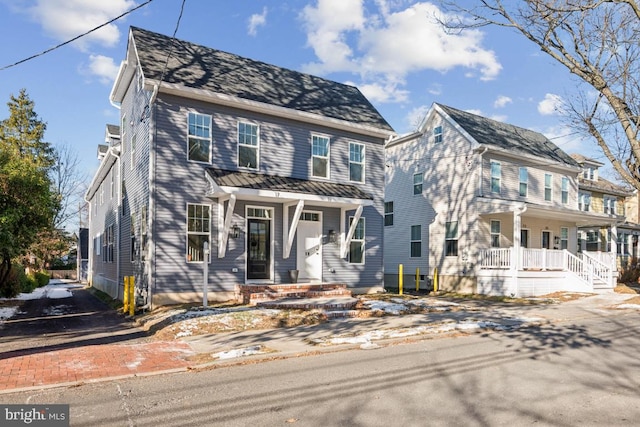 colonial home with a porch