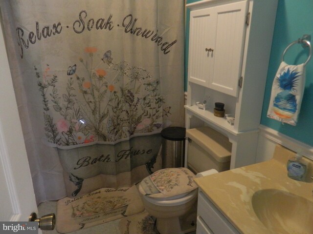 bathroom with vanity and toilet