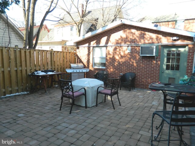 view of patio / terrace featuring a wall mounted AC