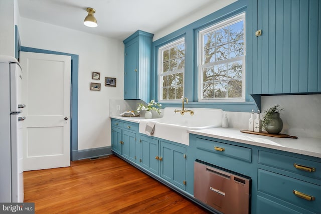 bathroom with sink and wood-type flooring