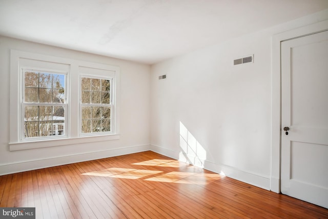 empty room with light wood-type flooring