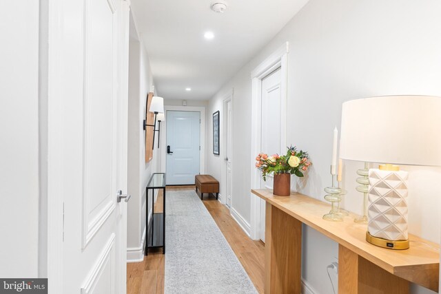 hallway featuring light hardwood / wood-style flooring