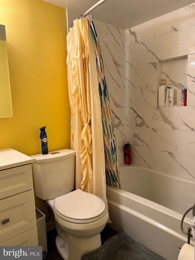 full bathroom with vanity, toilet, and shower / bath combo