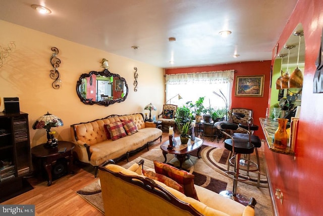 living room with light hardwood / wood-style floors