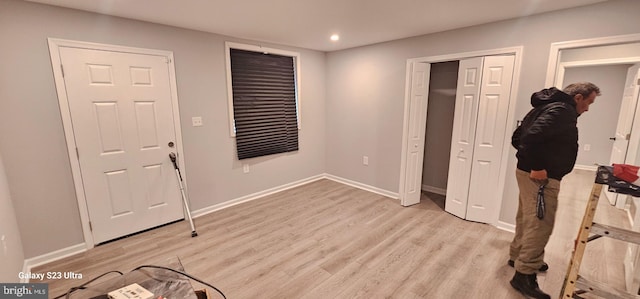 bedroom with light wood-type flooring