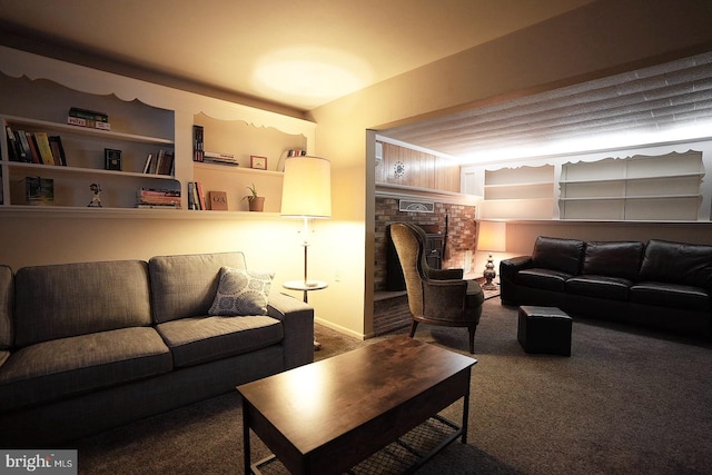 living room with a brick fireplace and carpet floors