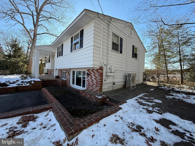 view of snow covered property