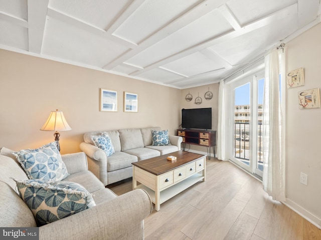 living room featuring light wood-type flooring and coffered ceiling