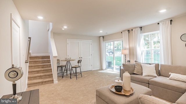 living room with light colored carpet