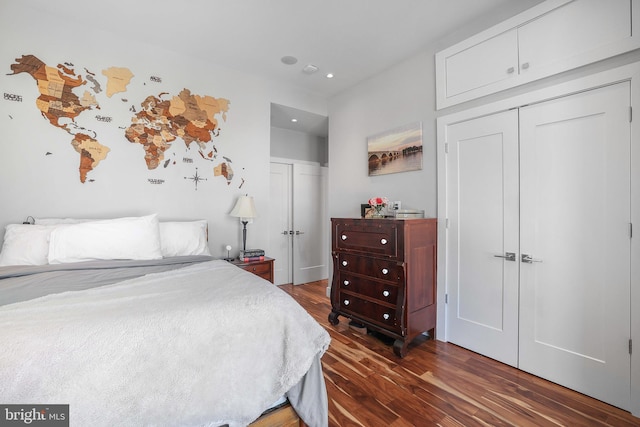 bedroom featuring dark hardwood / wood-style flooring