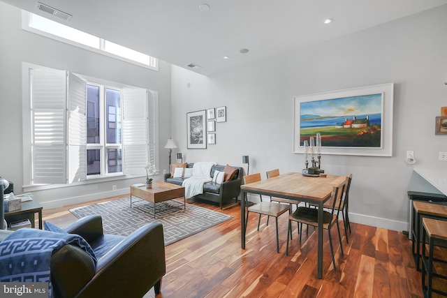 dining area featuring wood-type flooring