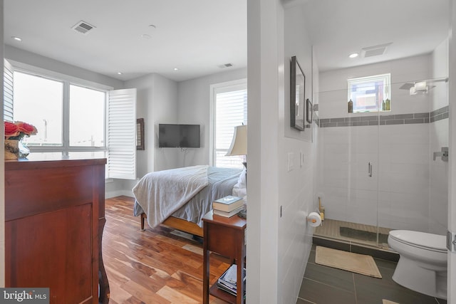 bedroom featuring hardwood / wood-style floors