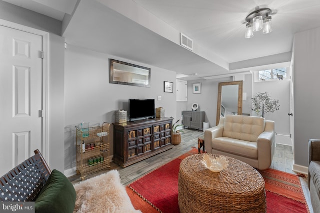 living room with hardwood / wood-style floors