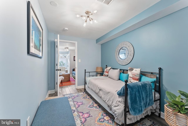 bedroom with light wood-type flooring