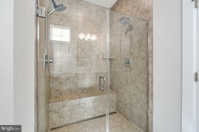 bathroom featuring a stall shower