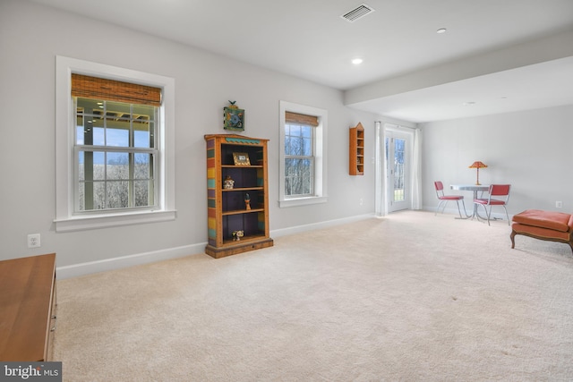 sitting room with carpet, visible vents, baseboards, and recessed lighting