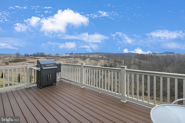 wooden deck with area for grilling