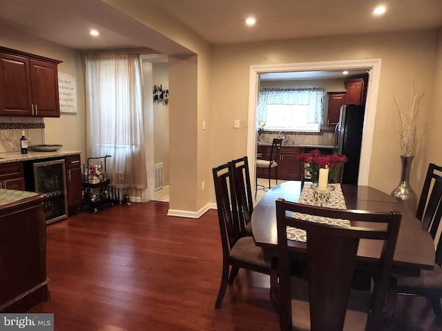 dining room featuring dark wood-type flooring