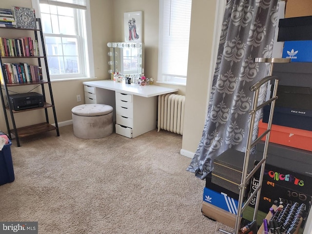 interior space featuring carpet and radiator