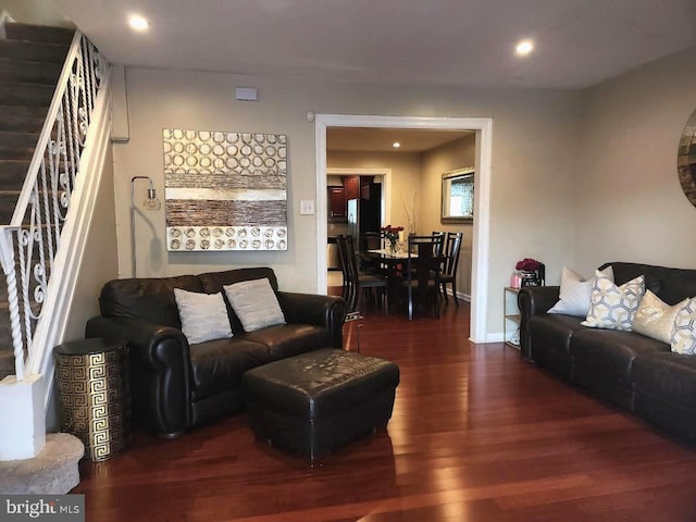 living room with dark wood-type flooring