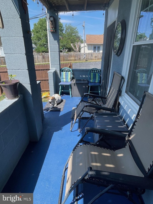 view of patio with a hot tub