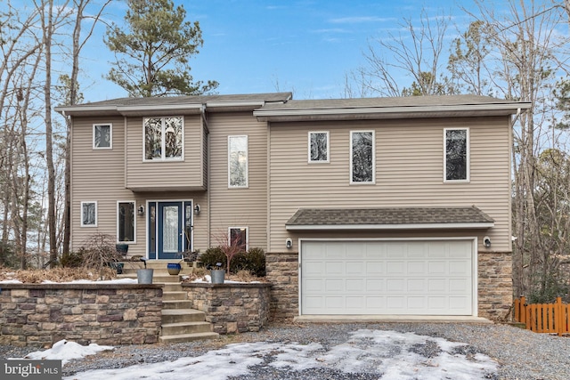 view of front of property featuring a garage