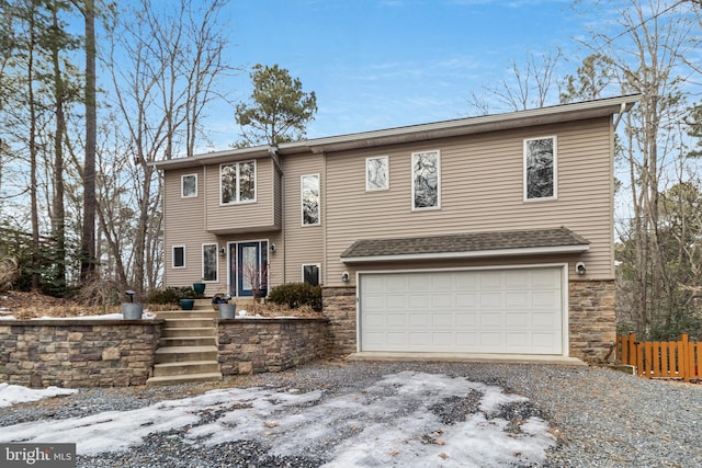 view of front of property with a garage