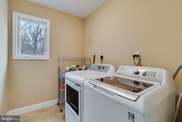 washroom with washer and clothes dryer