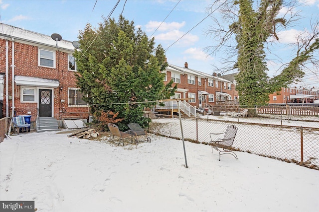 view of yard covered in snow