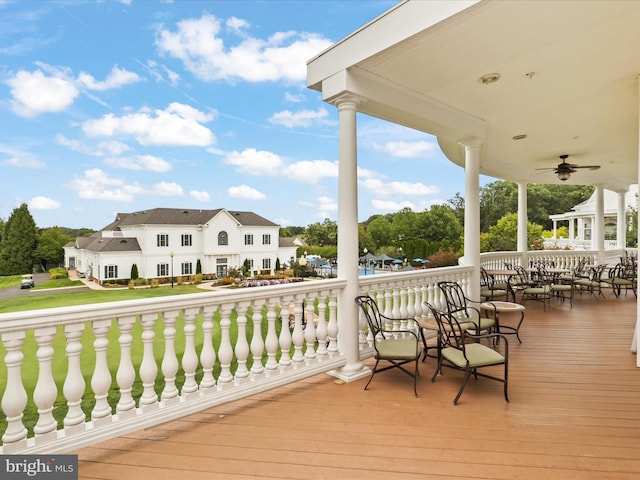 deck featuring ceiling fan and a porch