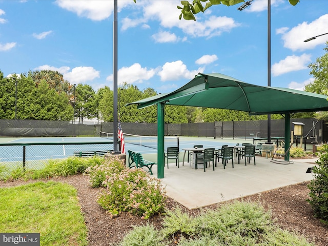 surrounding community with tennis court