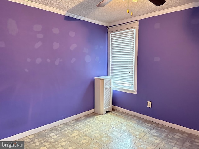 unfurnished room featuring ceiling fan, a healthy amount of sunlight, a textured ceiling, and ornamental molding