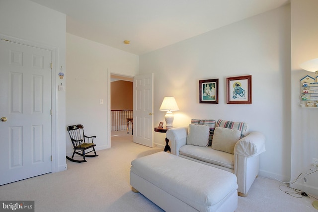 living room with light colored carpet