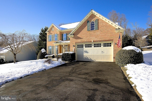 front of property featuring a garage