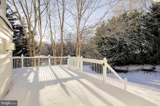 view of snow covered deck