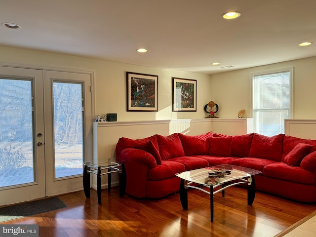 living room with french doors and hardwood / wood-style floors