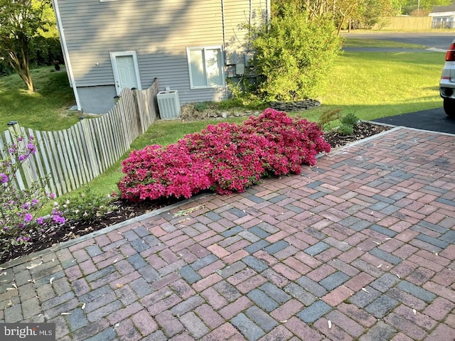 view of patio with central air condition unit