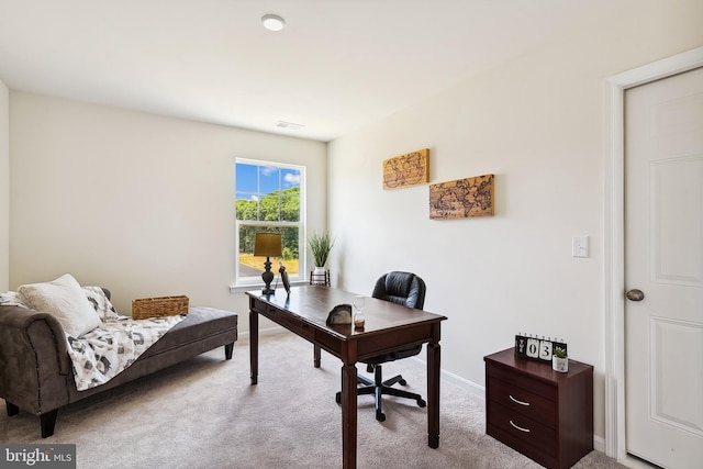 home office featuring light colored carpet