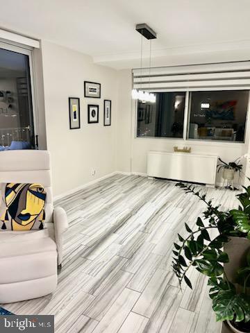 living room with light hardwood / wood-style floors