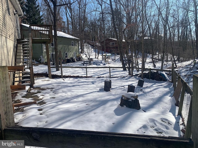 view of yard covered in snow