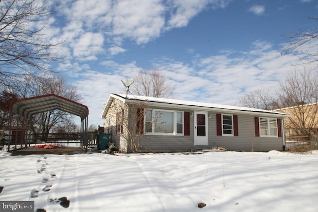 view of front of house with a carport